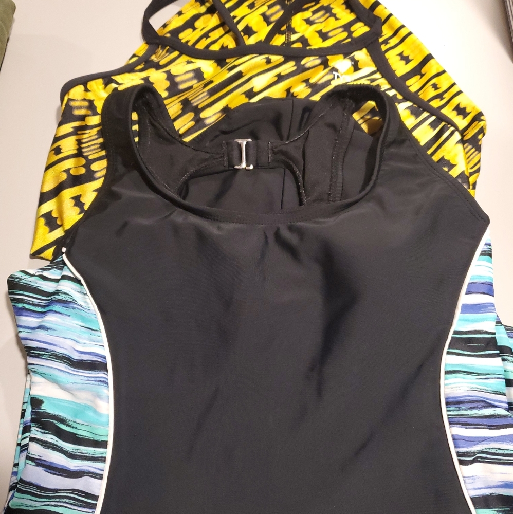 (2) 1 piece Swimsuits.  size Lg. 12-14